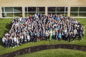 Participants in the "Where Are You From?" outreach program gather to celebrate the program's completion. High school students from across Denmark took part in the program.